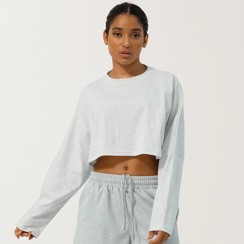 Elevate Your Workout with Our Women's Long Sleeve Fitness Crop Top - The Perfect Soft, Solid Color T-Shirt for Running and Yoga!