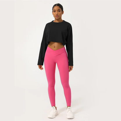 Elevate Your Workout with Our Women's Long Sleeve Fitness Crop Top - The Perfect Soft, Solid Color T-Shirt for Running and Yoga!